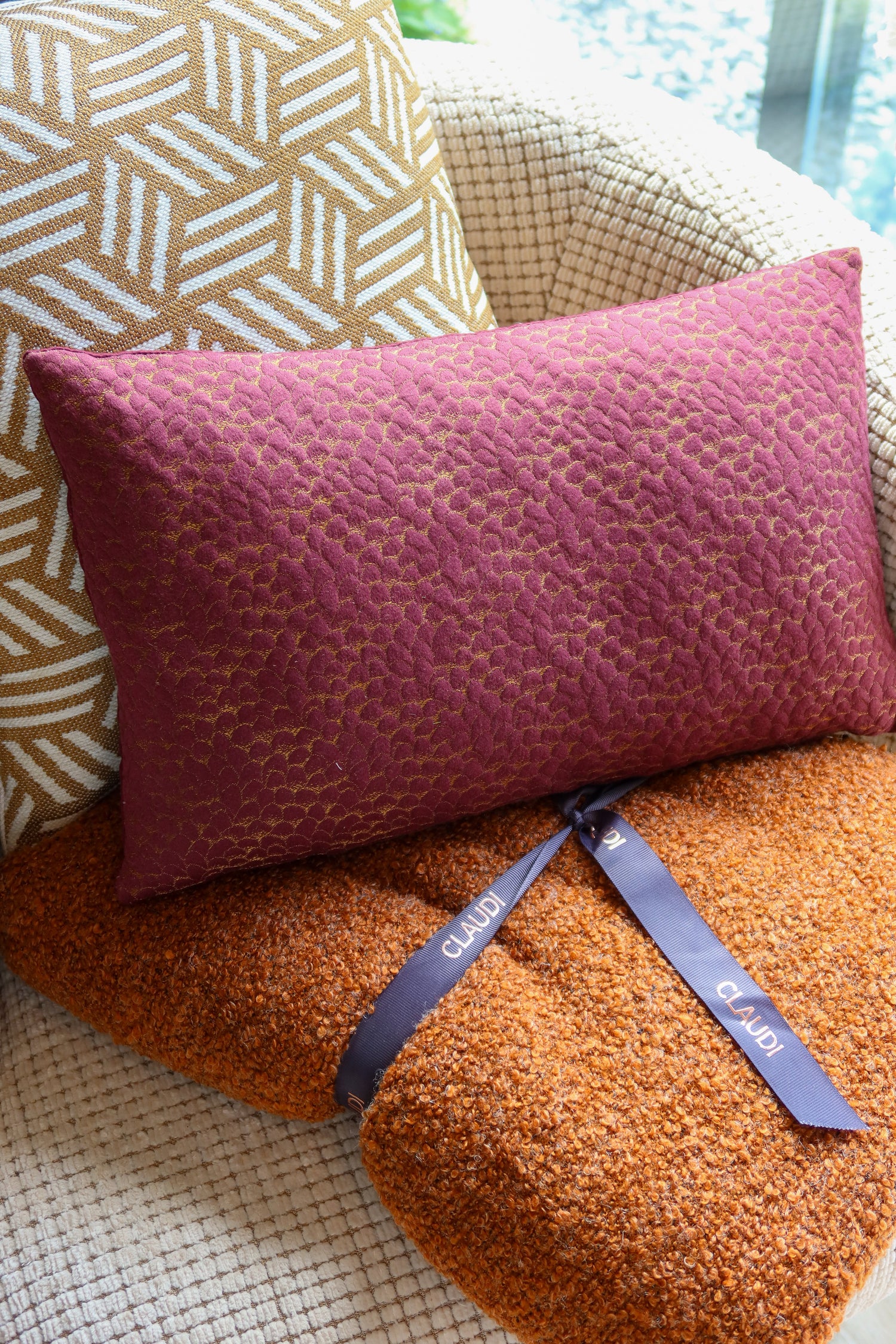 Kussens, plaids en vloerkleden